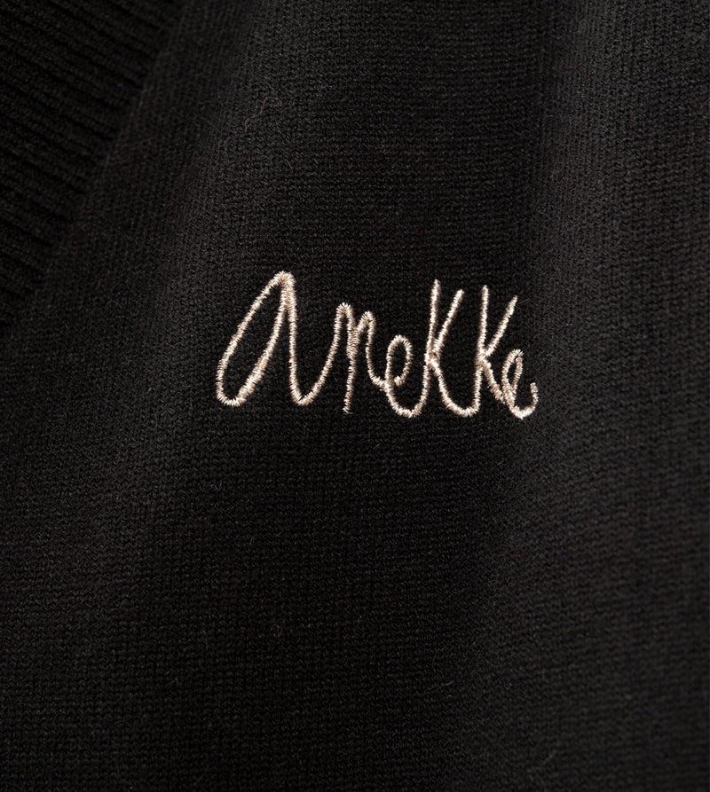 Anekke Black poncho-style jacket Promoción trimestral