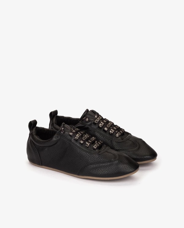 Cuplé ZAPATILLA NEGRA DE TECNOPIEL ESTILO GOLF Liquidación