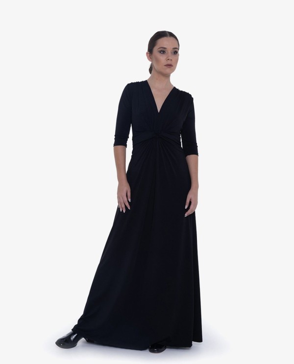 Cuplé MAXI VESTIDO NEGRODE PUNTO CON NUDO FRONTAL Y MANGAS TRES CUARTOS