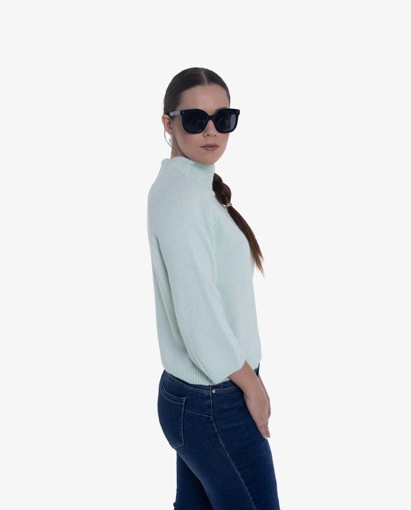 Cuplé JERSEY DE PUNTO VERDE CON CUELLO ALTO Y MANGAS TRES CUARTOS Libre de impuestos